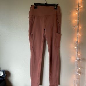 Peach colored leggings with pockets!